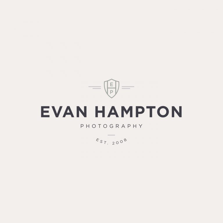 Masculine crest logo design for photographer Evan Hampton by Davey & Krista